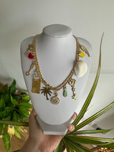 Gold multi charm necklace