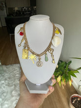 Gold multi charm necklace