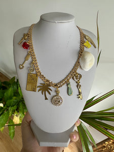 Gold multi charm necklace