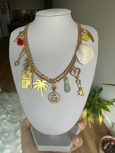 Gold multi charm necklace