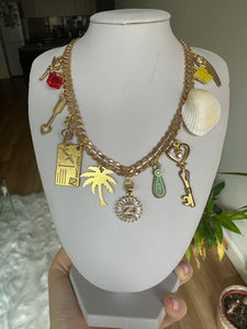 Gold multi charm necklace