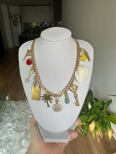 Gold multi charm necklace