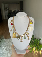 Gold multi charm necklace